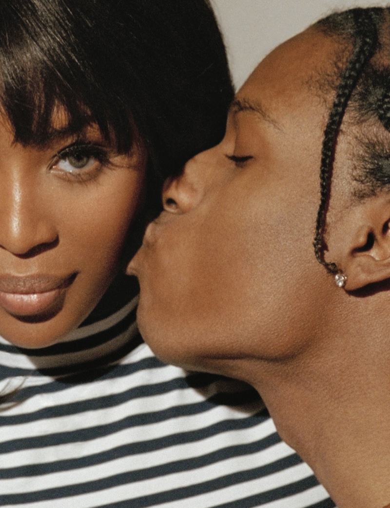 Naomi Campbell wears a striped shirt while A$AP Rocky gives her a smooch
