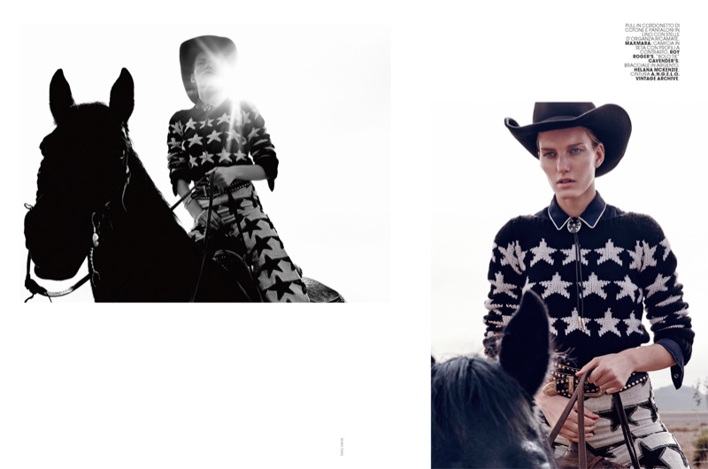 Marique poses on a horse while wearing Max Mara star print sweater