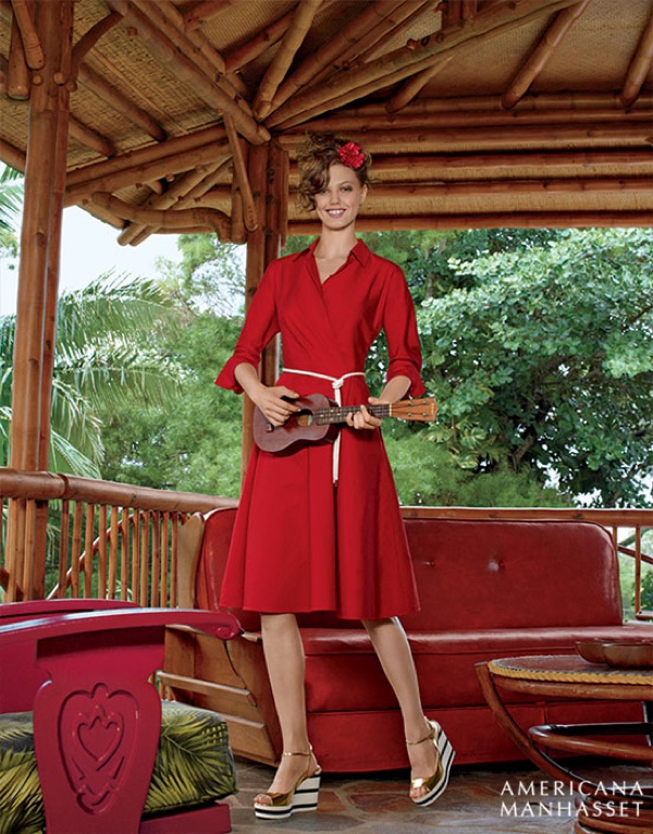 Playing the ukulele, Lindsey models Max Mara a-line dress in red