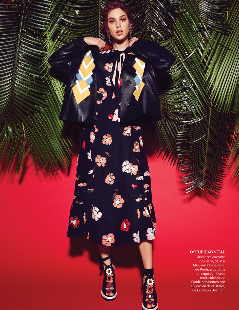 Anais Pouliot poses in oversized leather jacket and floral print dress from Miu Miu with Fendi sandals