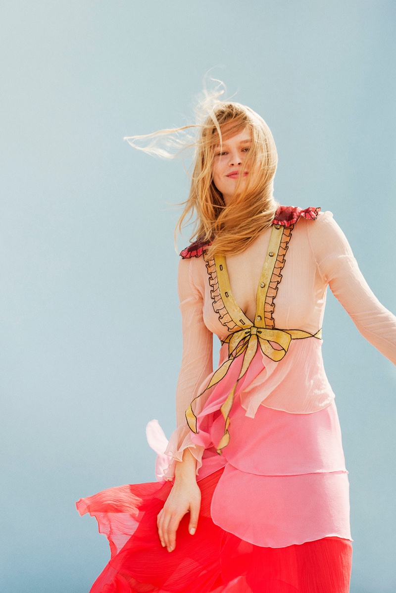 Anna Ewers looks pretty in pink wearing a ruffle embellished Gucci dress