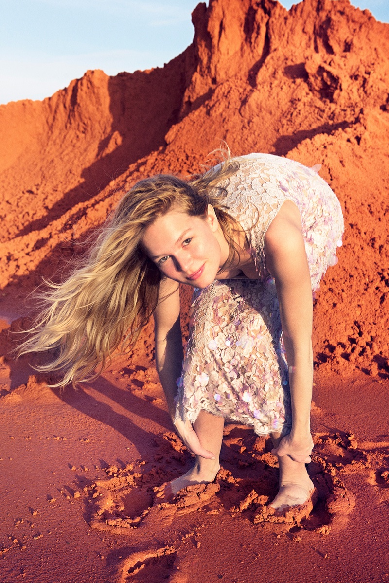 Photographed by Ryan McGinley, Anna Ewers poses in a Balenciaga lace dress