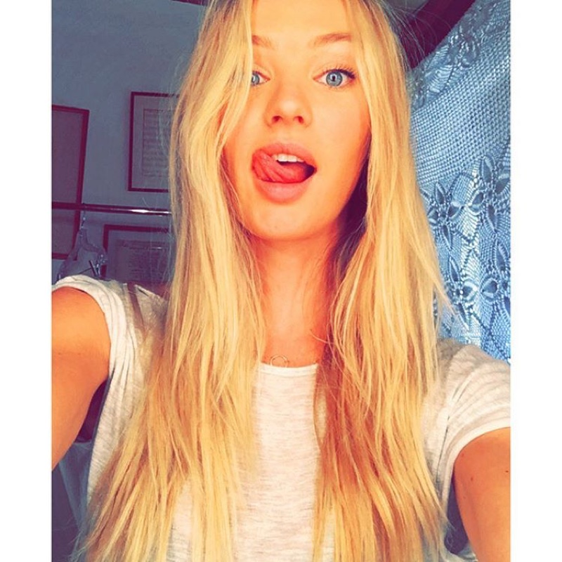 Candice Swanepoel sticks out her tongue in a fun Instagram snap.