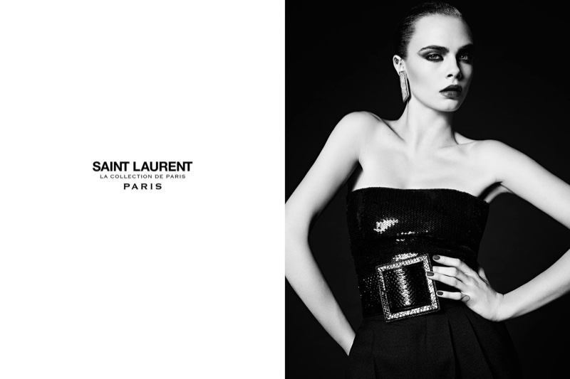 Cara Delevingne poses in a strapless dress with an embellished belt for Saint Laurent's Paris campaign