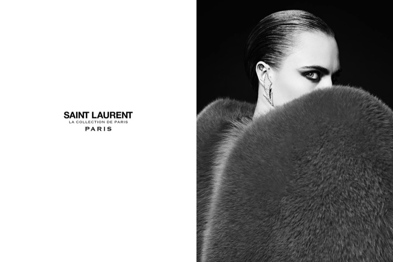 Photographed by Hedi Slimane, Cara Delevingne models a fur coat