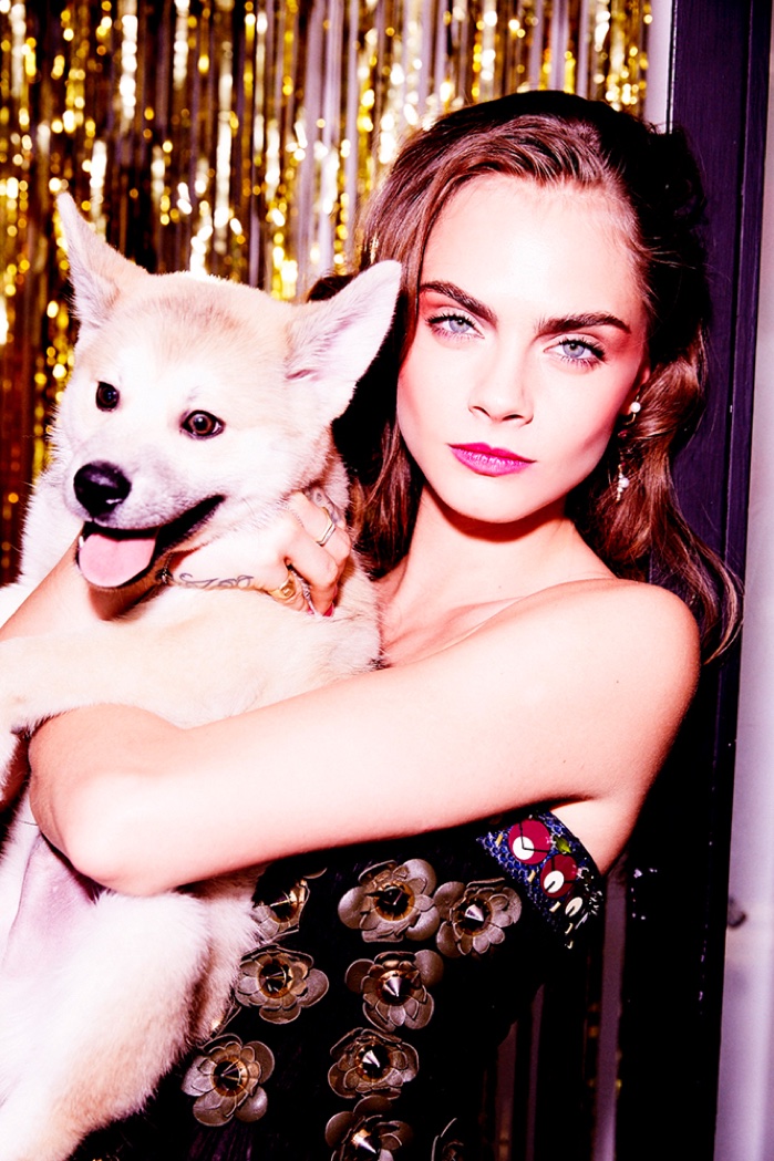 Photographed by Ellen Von Unwerth, Cara Delevingne poses with her new dog