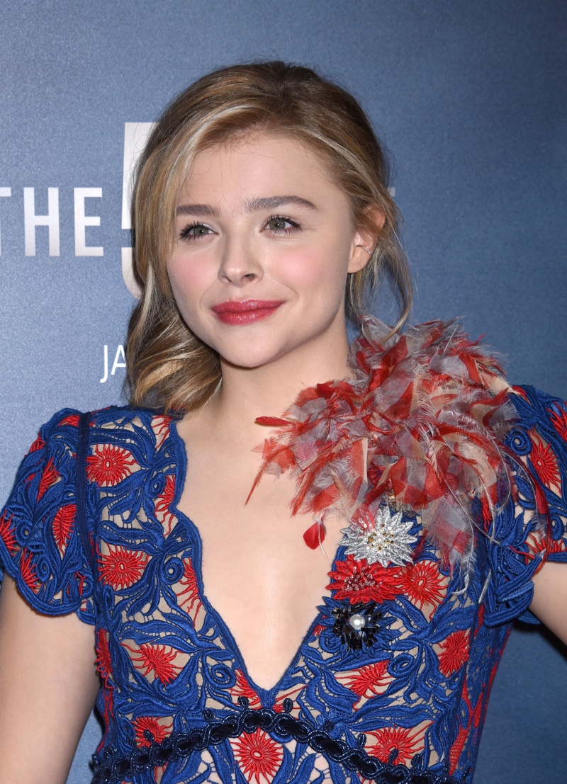 JANUARY 2016: Chloe Grace Moretz attends the premiere of The 5th Wave wearing a blue and red Marc Jacobs dress. Photo: Ga Fullner / Shutterstock.com