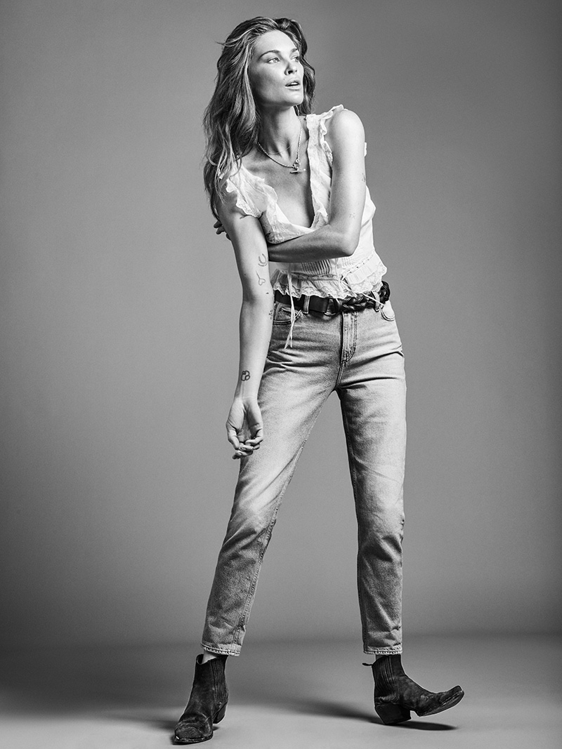 Erin Wasson models a white tank top and jeans