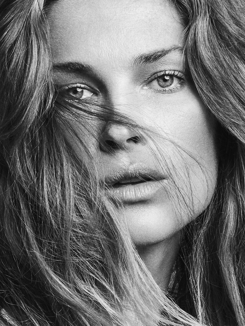 Wearing her hair in tousled waves, Erin Wasson poses for TELVA Magazine