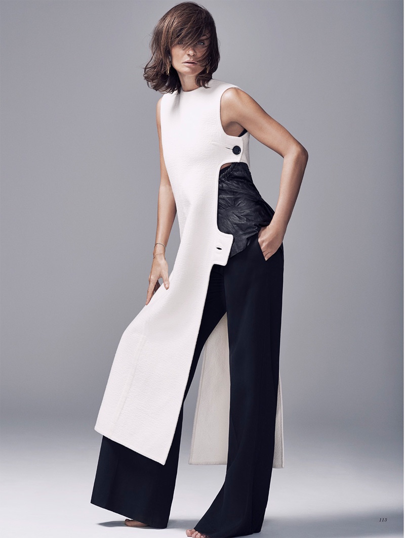 Hitting the studio, Helena Christensen wears a white tunic and black trousers from Celine