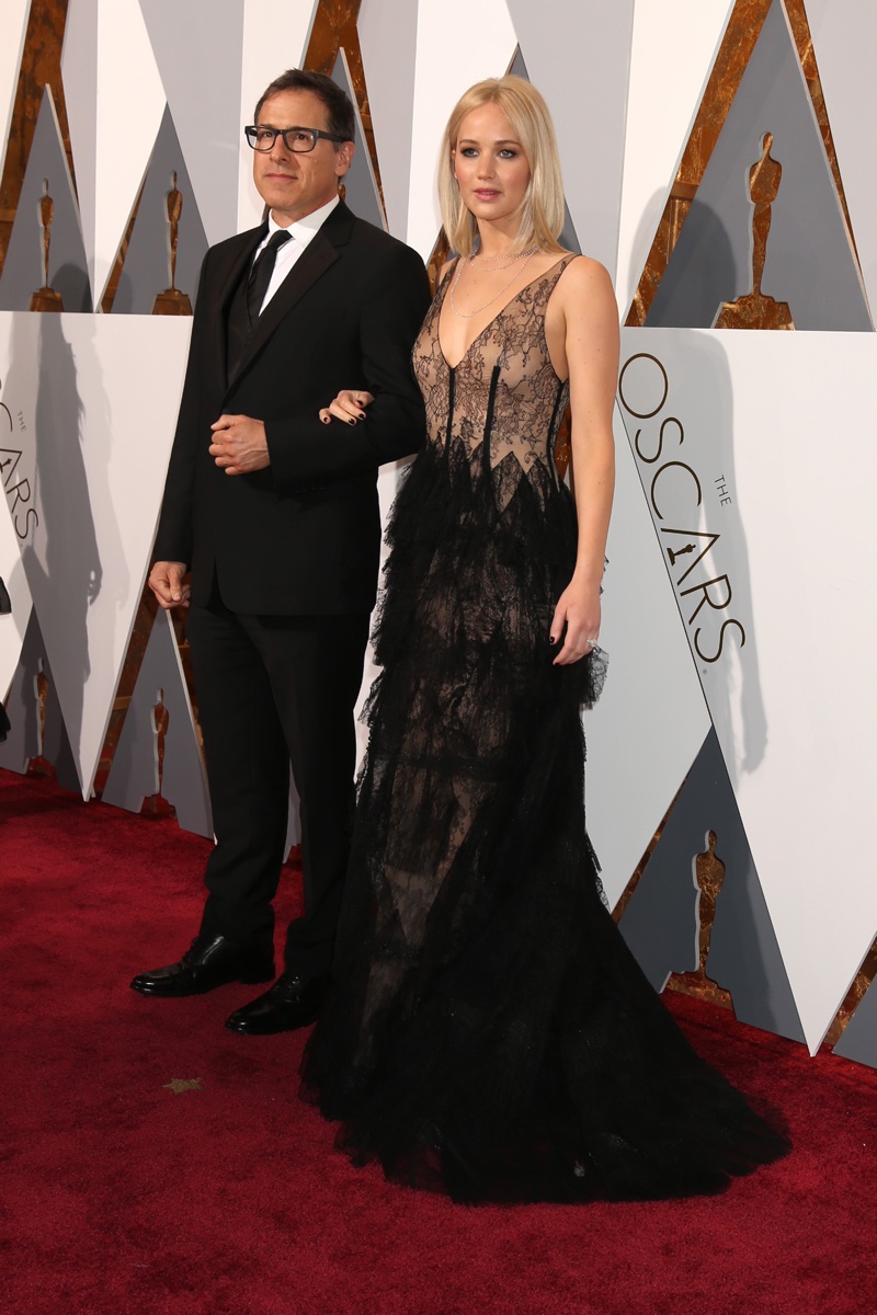 OSCARS 2016 STYLE: Jennifer Lawrence attends the 88th Academy Awards with director David O'Russell wearing a black Dior gown. Photo: Helga Esteb / Shutterstock.com