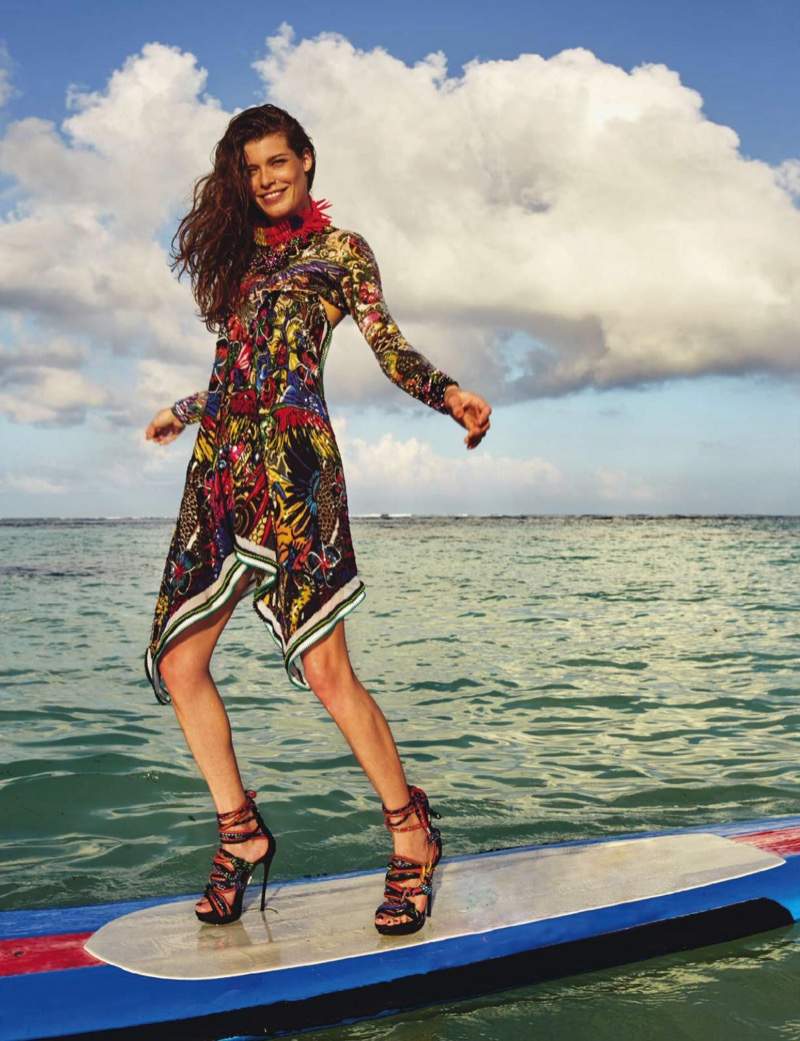 Surf's up as Louise Pedersen rides a wave in DSquared2 handkerchief hem dress and strappy sandals