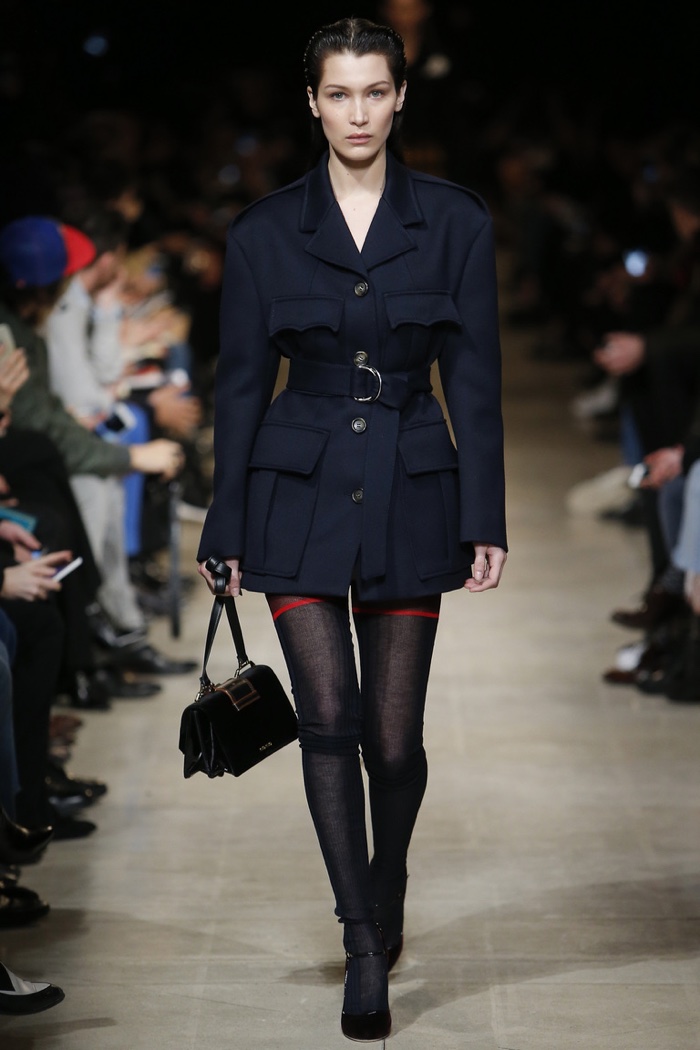 Bella Hadid walks the runway at Miu Miu's fall-winter 2016 show during Paris Fashion Week