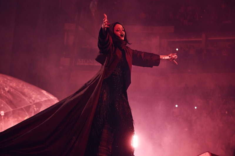 MARCH 2016: Rihanna performs at the 2016 ANTI World Tour wearing a Giorgio Armani jumpsuit and hooded coat. Photo: Dennis Leupold