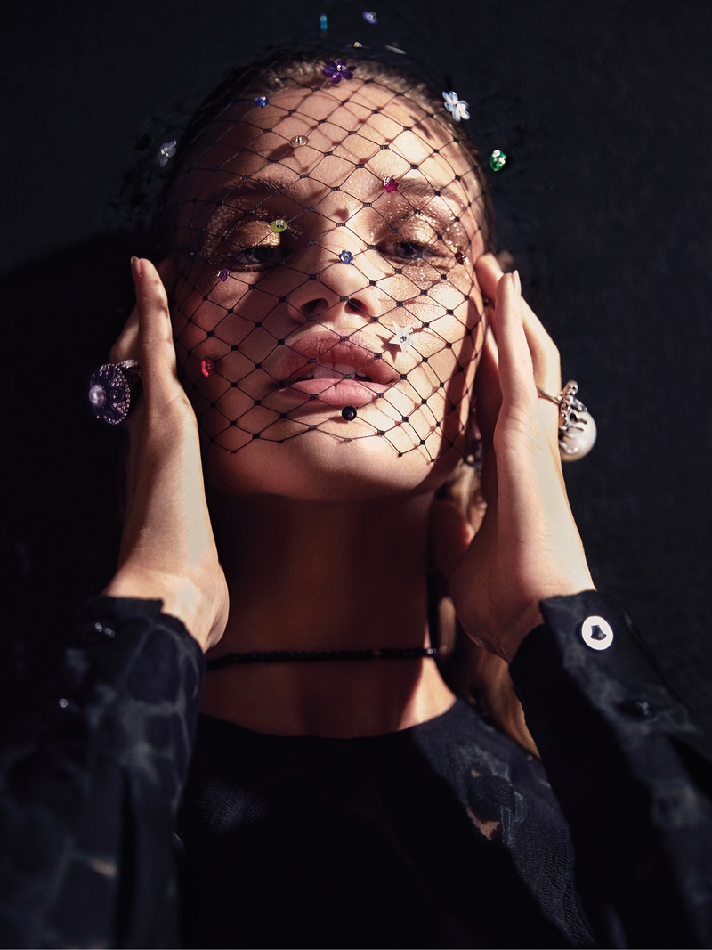 Rosie Huntington-Whiteley models a mesh veil with jewelry from Piers Atkinson. Photo: Hunger / Dusan Reljin