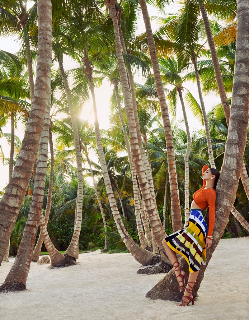 Posing with palm trees, Samantha models a Missoni crop top and striped skirt