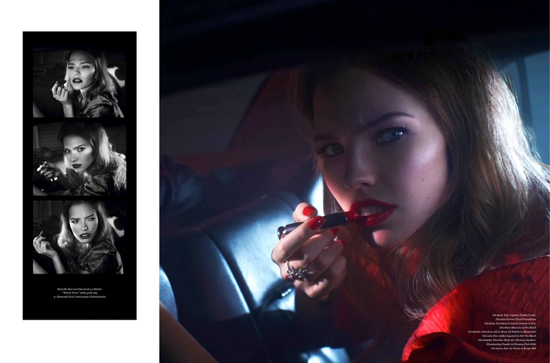 Sasha Luss applies Dior Addict Lipstick while wearing a red Oscar de la Renta jacket