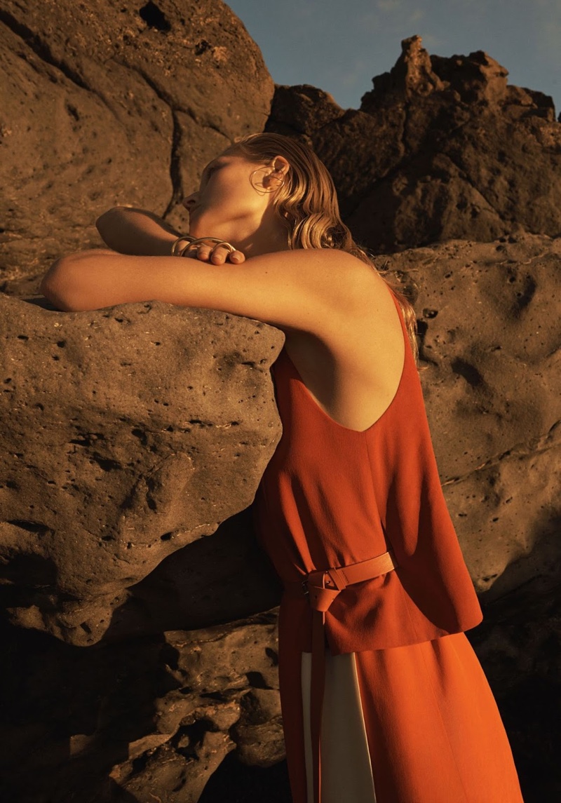 Toni Garrn poses in an Hermes top and skirt
