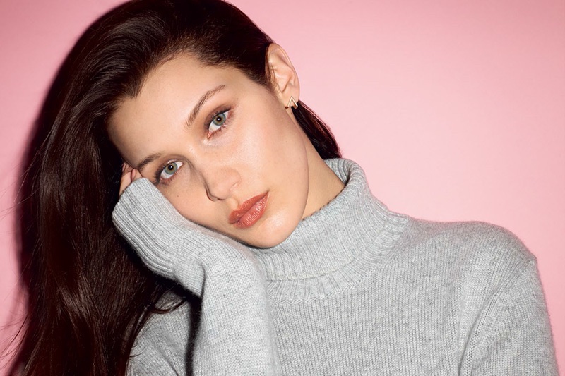 Photographed by Terry Richardson, Bella Hadid wears a grey turtleneck sweater for the fashion editorial