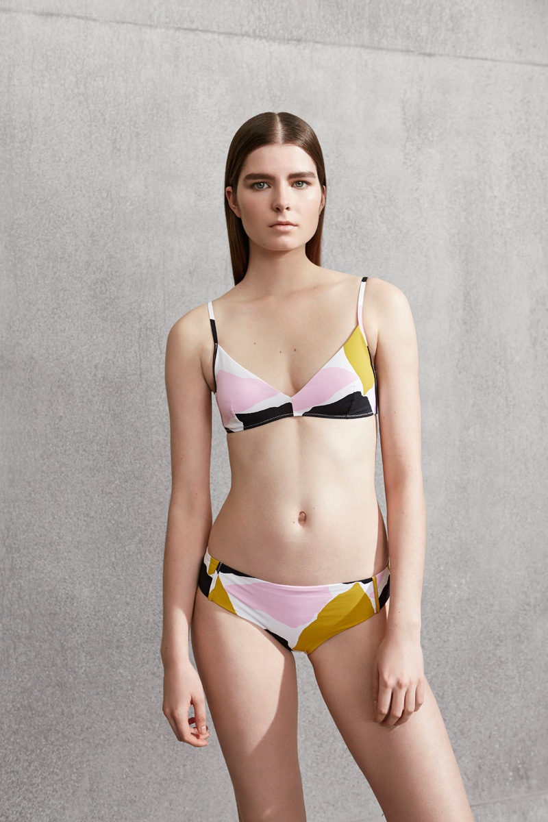 Focusing on prints, COS offers a multi-colored bikini for swim season