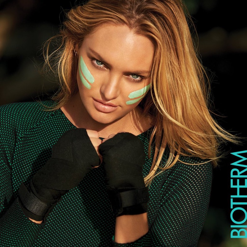 Candice Swanepoel puts on some face paint for Biotherm