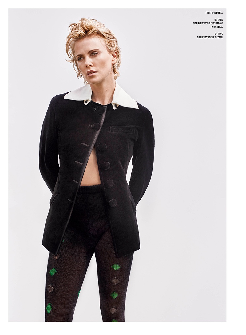 Charlize Theron channels her modeling day in a Prada jacket and tights