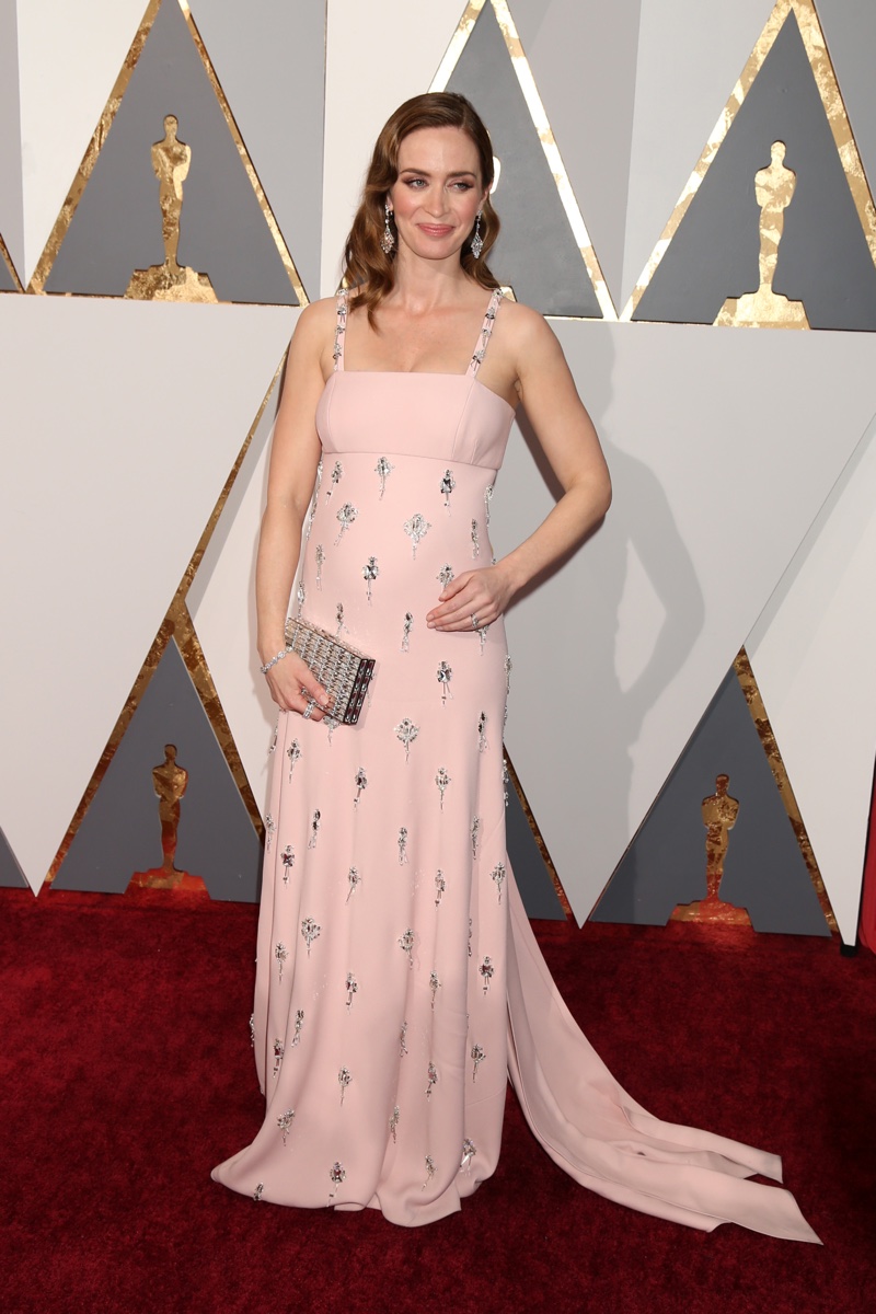 FEBRUARY 2016: A pregnant Emily Blunt attends the 2016 Oscars wearing a pink Prada dress with crystals: Photo: Helga Esteb / Shutterstock.com