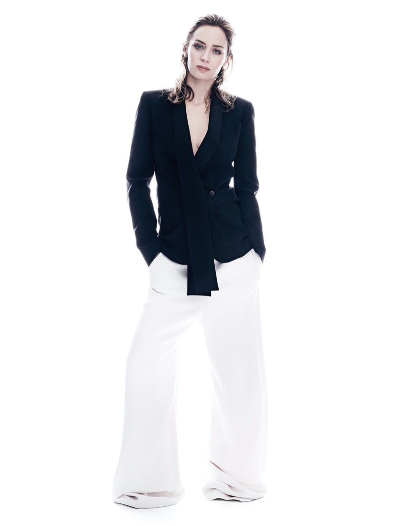 Emily Blunt strikes a pose in Michael Kors Collection blazer with white Balenciaga pants