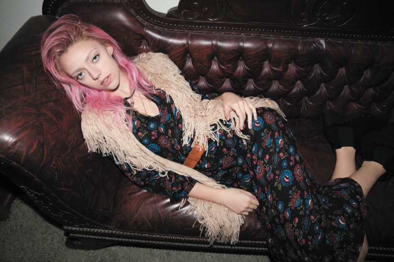 Pyper America Smith chills in a printed romper and faux fur vest from Forever 21