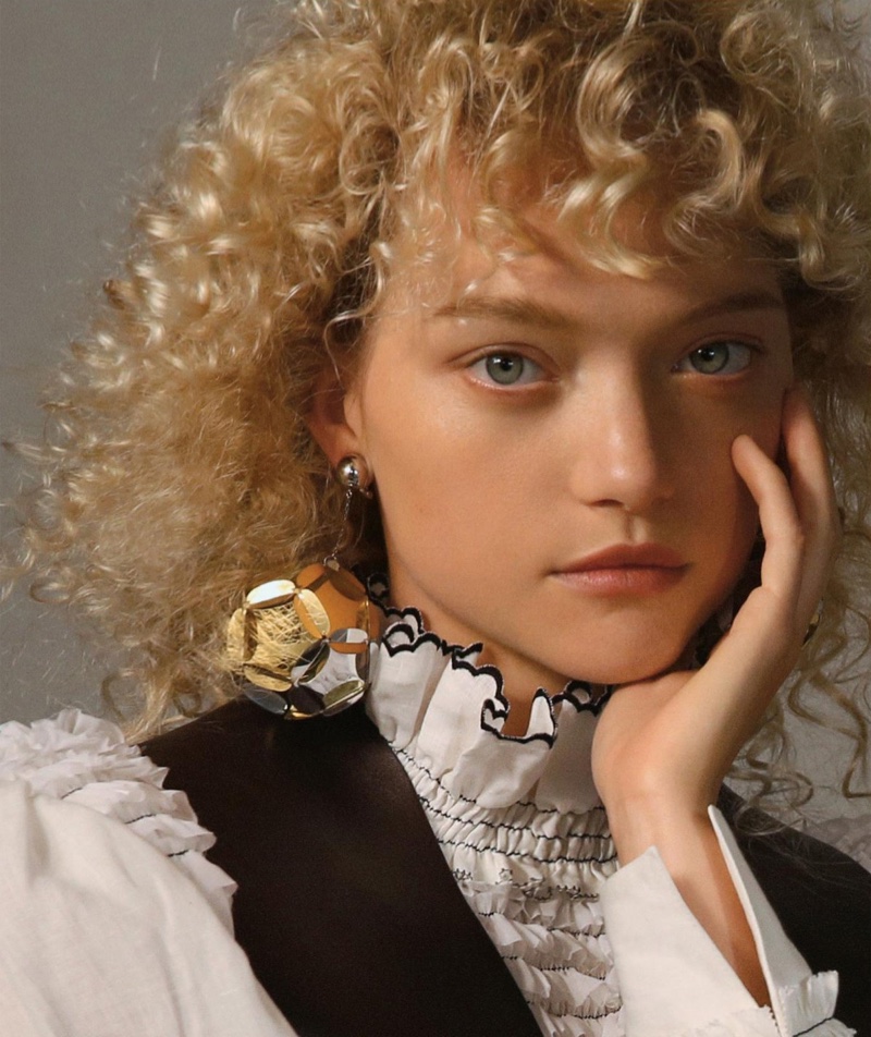 Gemma Ward models blonde curls in the fashion editorial