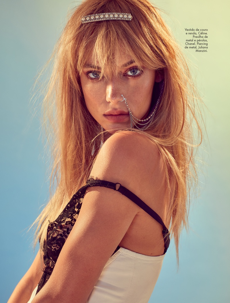 Hannah Ferguson models a nose ring and a Celine top with black lace embellishment