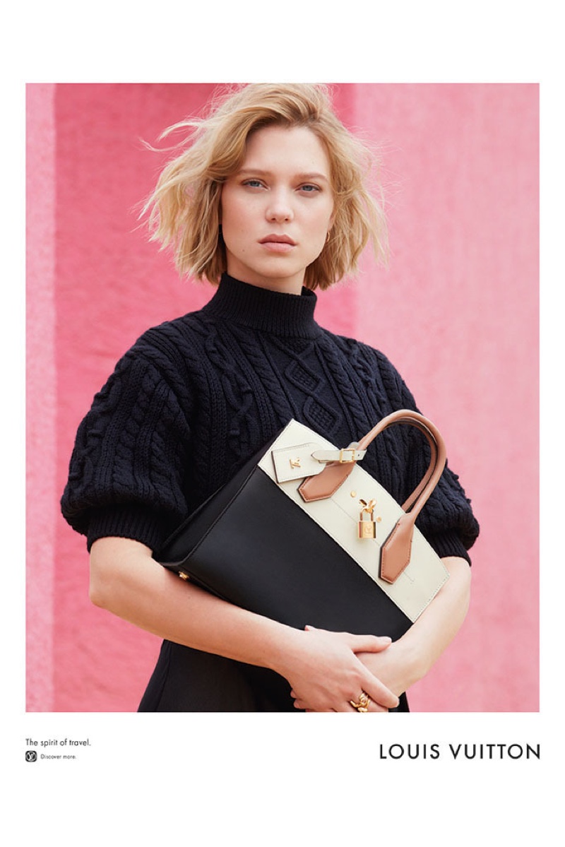 Lea Seydoux poses with Louis Vuitton's Capucines bag