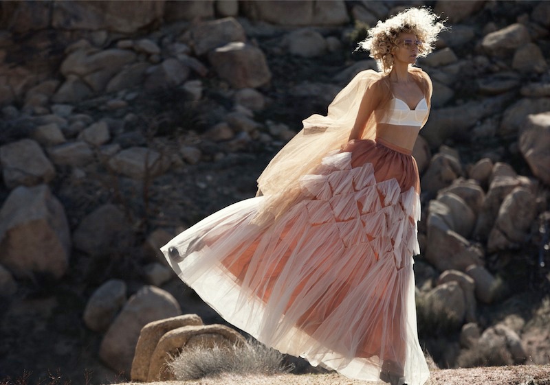 Sarah Deanna models a white bra top and tulle skirt from Dries Van Noten