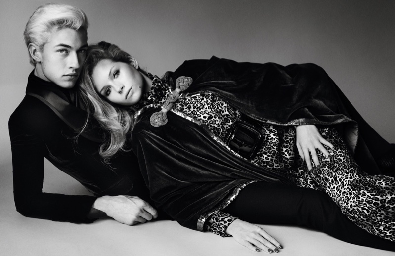 Lucky Blue Smith and Lottie Moss lounge in this black and white photograph