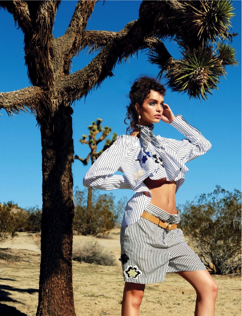 Posing in the desert, Luma wears a striped cotton top and shorts from Tod’s