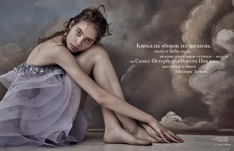 Model poses in multi-tiered lilac dress from Armani Prive