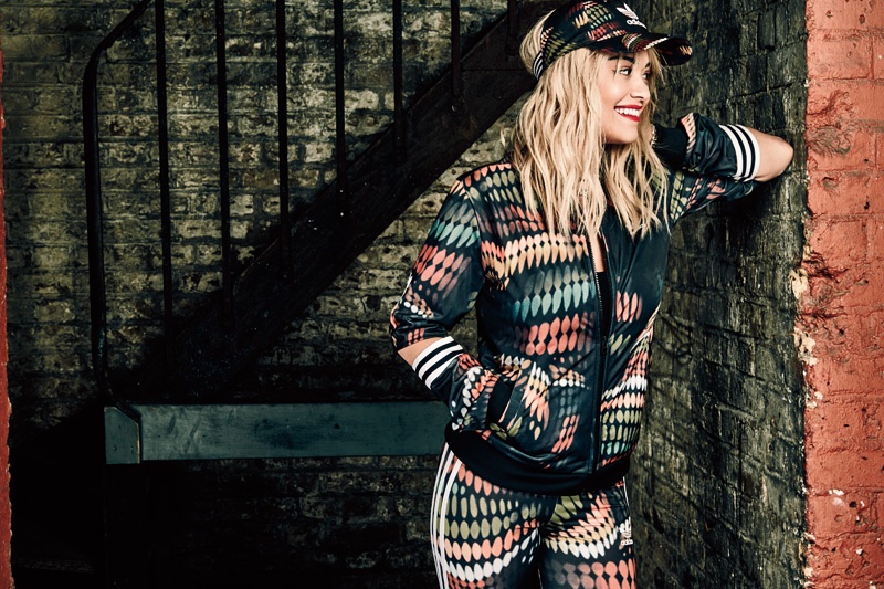 Rita Ora poses in adidas Originals cutout tracket jacket and leggings