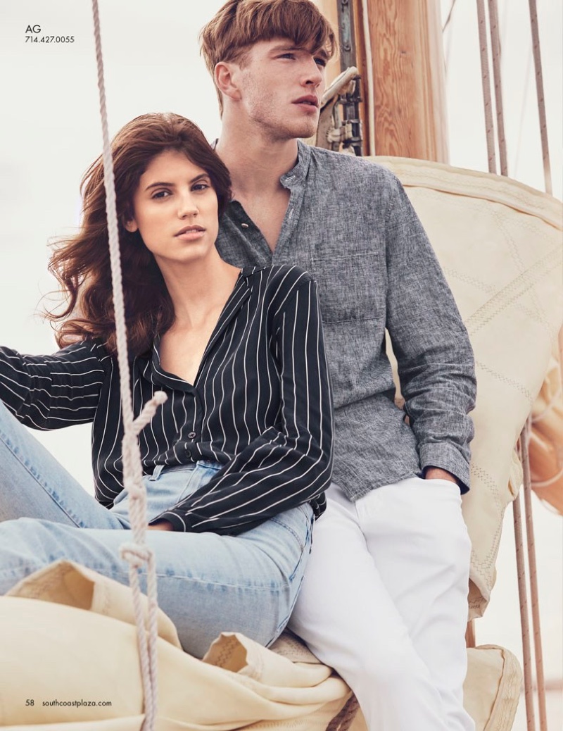 Posing at sea, the model poses alongside Eric Weiss in nautical inspired fashions