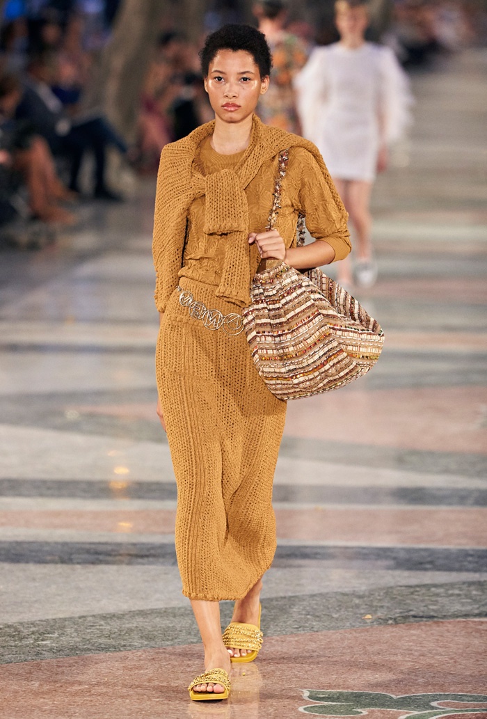Lineisy Montero walks Chanel’s cruise 2017 show wearing a knitted sweater, top, skirt and embellished sandals