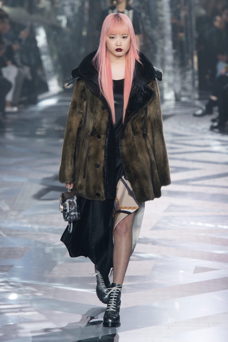 MARCH 2016: Fernanda Ly walks the runway at Louis Vuitton's fall-winter 2016 show during Paris Fashion Week