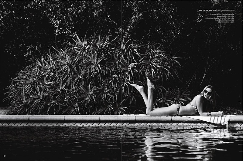 Posing poolside, the blonde models Calzedonia bikini and Miu Miu sunglasses