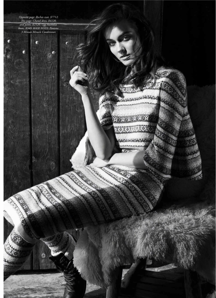 Photographed in black and white, Jac poses in a Chanel knit dress with UGG boots