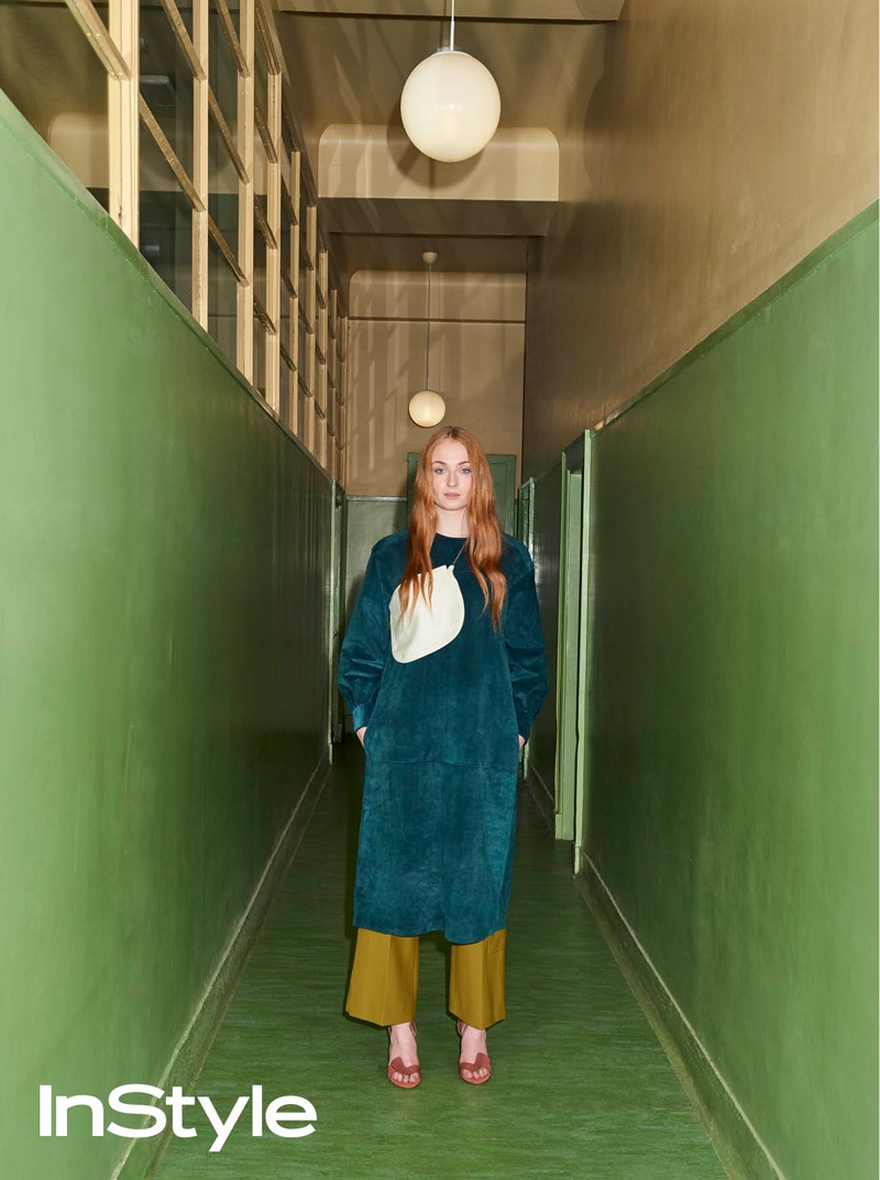 Sophie Turner wears Celine tunic, bag and pants