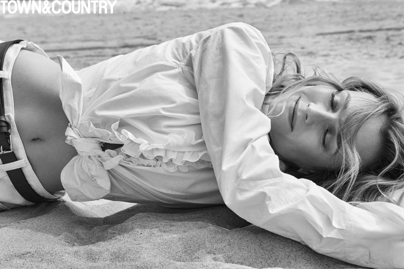 Photographed in black and white, Diane Kruger wears Ralph Lauren Collection shirt, Denim & Supply shirts with Hermes belt