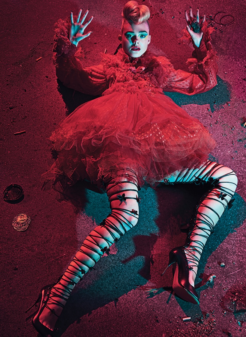 Elle Fanning poses in red Edward Meadham for Sophia Webster dress with Sophia Webster shoes