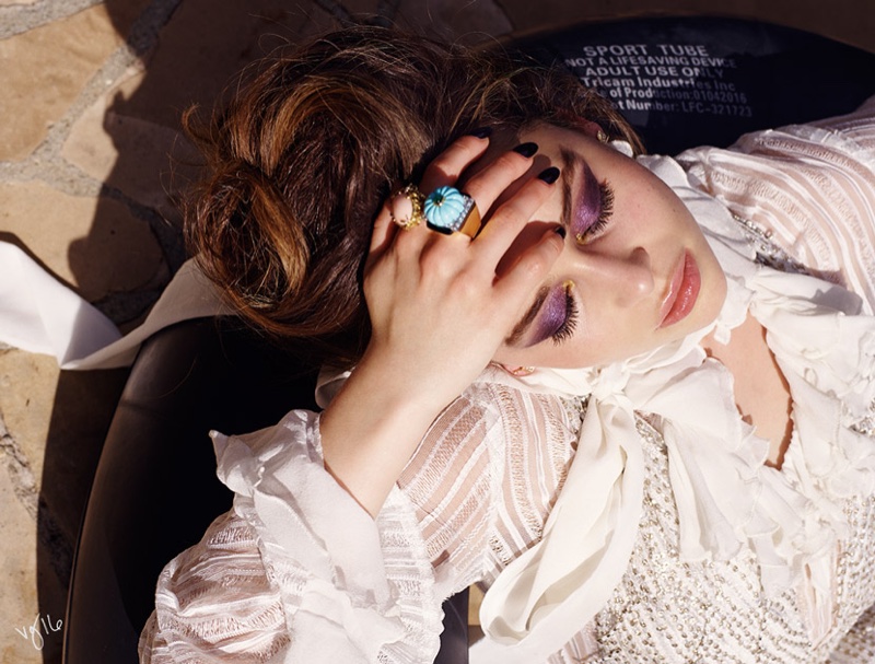 Emilia Clarke gets her closeup with purple eyeshadow, David Webb ring and Rodarte blouse