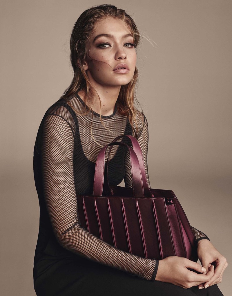 Gigi Hadid poses with the Max Mara Whitney Bag