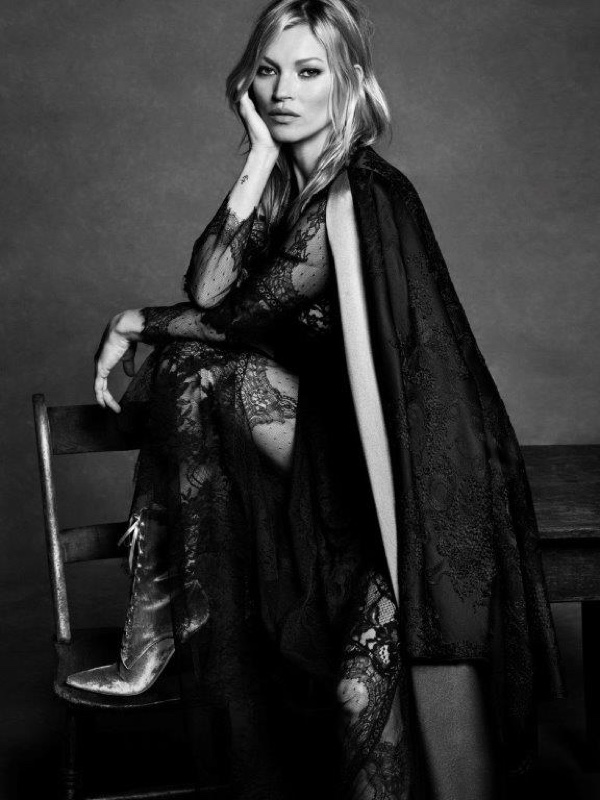 Photographed in black and white, Kate Moss wears a dramatic cape look for Alberta Ferretti's fall-winter 2016 campaign