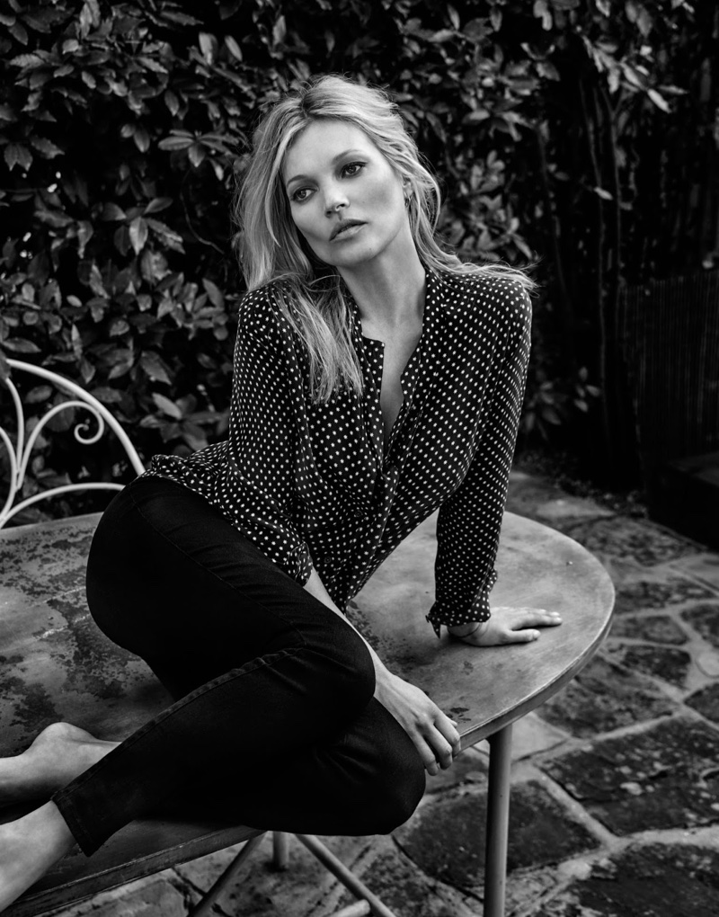 Photographed in black and white, Kate wears Kate Moss for Equipment polka dot shirt and pants