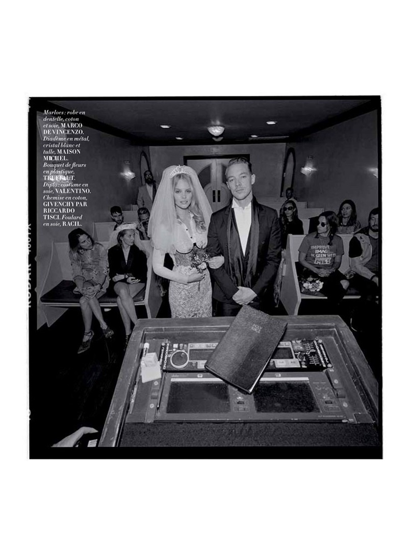 Photographed in black and white, Marloes Horst and Diplo pose at the altar